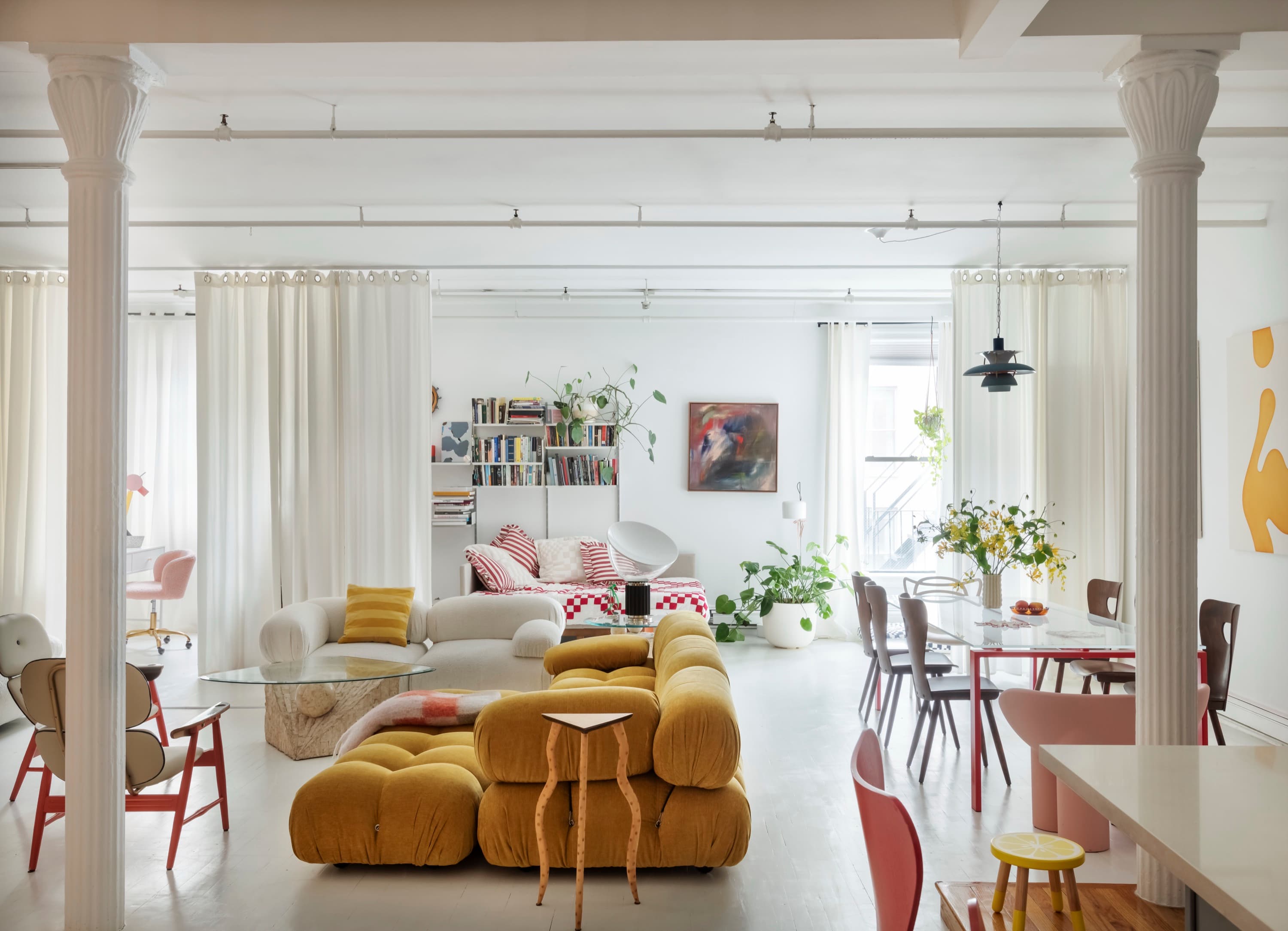 witness locations wrays loft tribeca manhattan living room mustard sofa columns dining