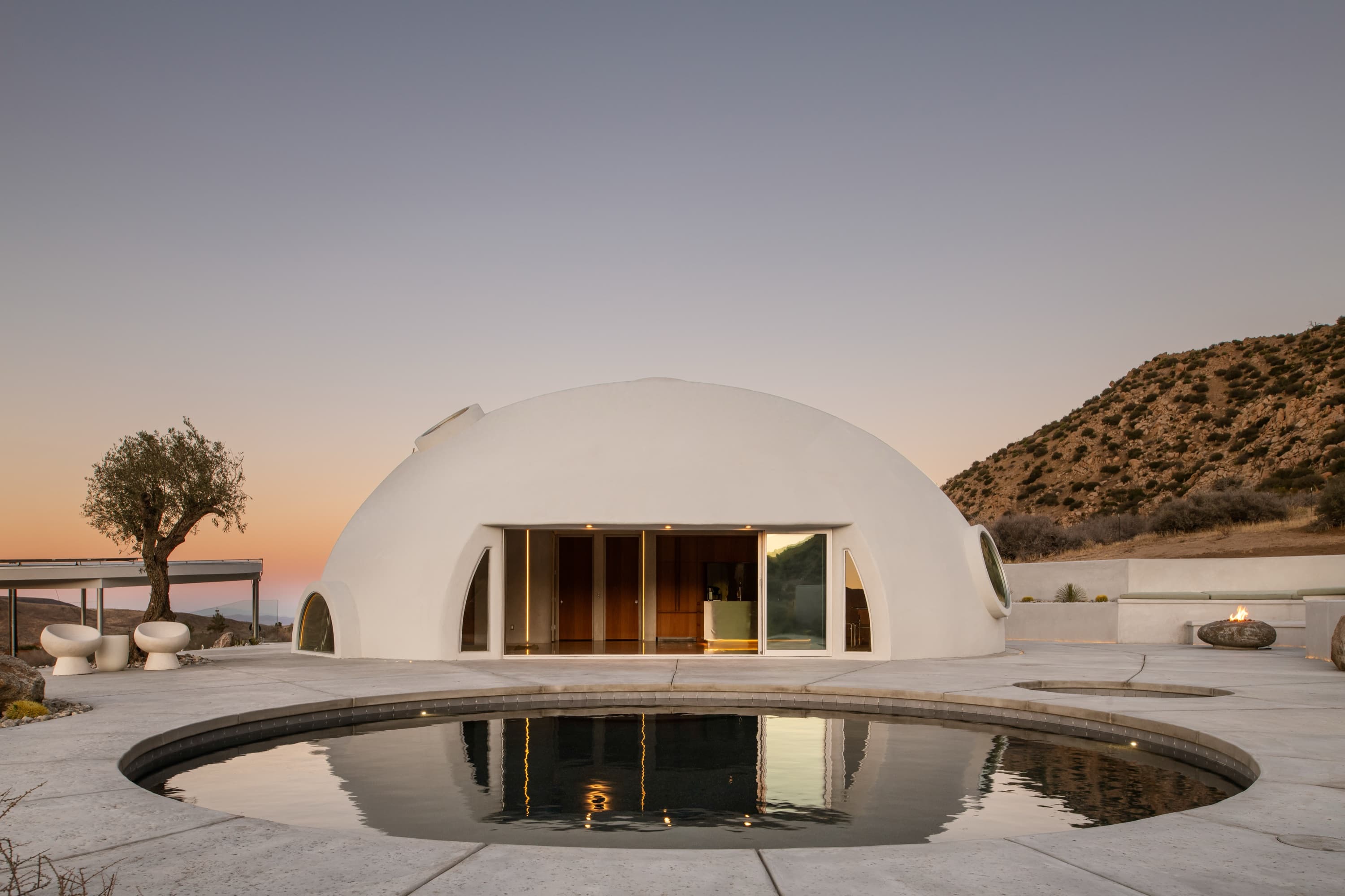 witness locations desert dome pioneertown yucca valley exterior dome pool reflection dusk