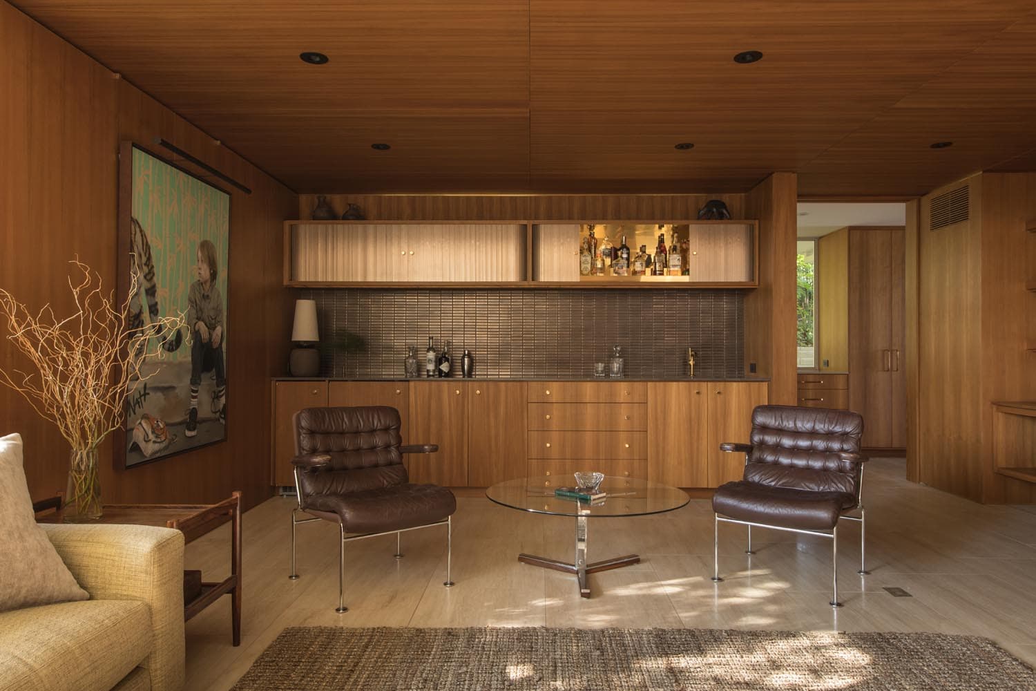 witness locations clear oak encino los angeles den walnut paneling leather chairs bar