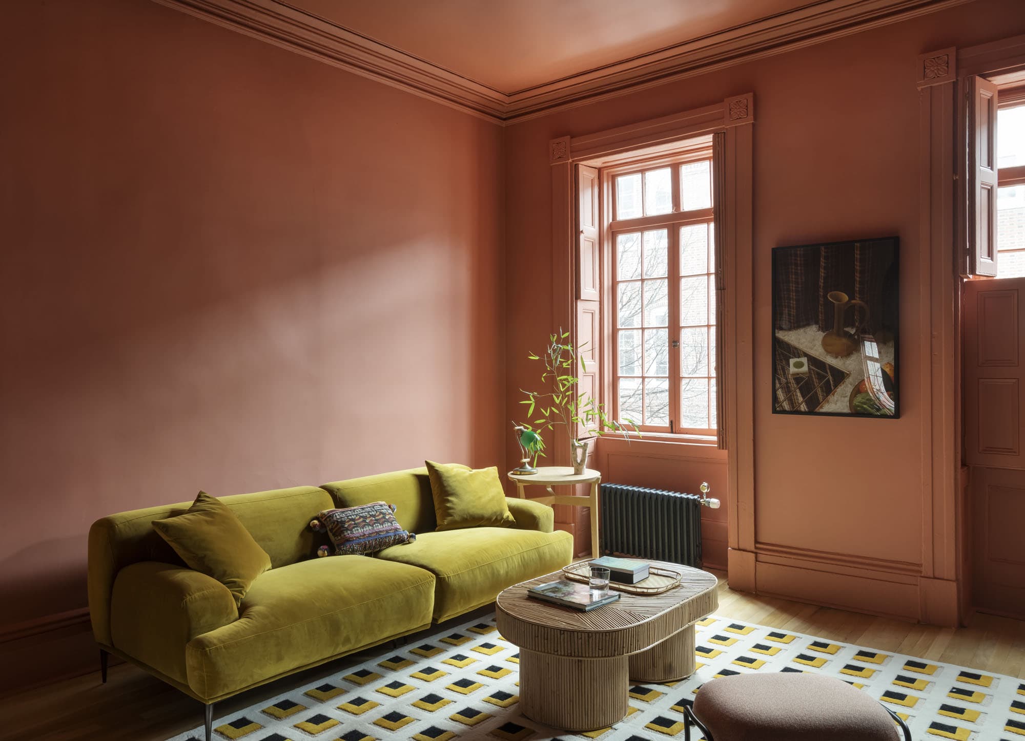 witness locations horatio place terracotta room west village new york living room terracotta walls chartreuse sofa