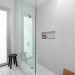 Bright living area with simple furnishings and garden view