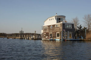 Exterior view of the Harbor Nest Boathouse on Shelter Island, Long Island, a historic waterfront event venue.